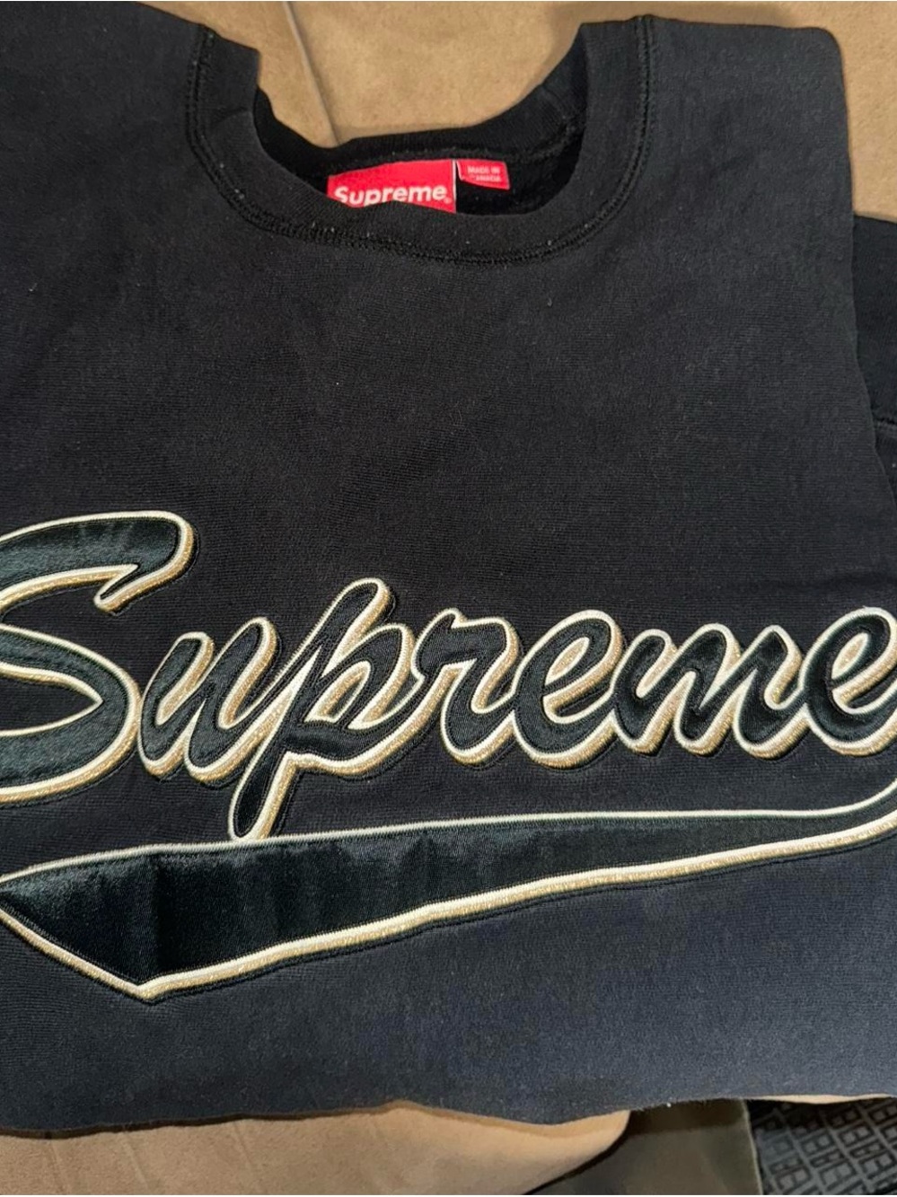 Supreme Black Sweatshirt with Gold-Outlined Script Logo